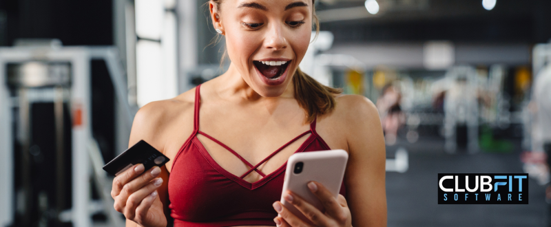 woman purchasing gym membership in mobile app