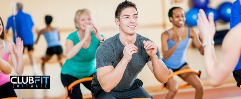 trainer leading a group fitness class