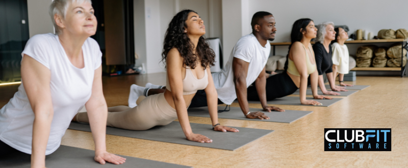 a yoga instructor guiding a class