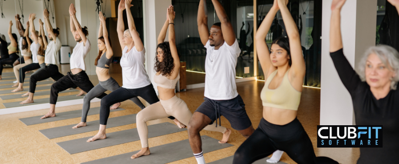 members practice in yoga studio